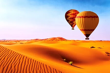 A hot air balloon ride in Dubai offers a breathtaking way to see the city’s vast desert landscape from above